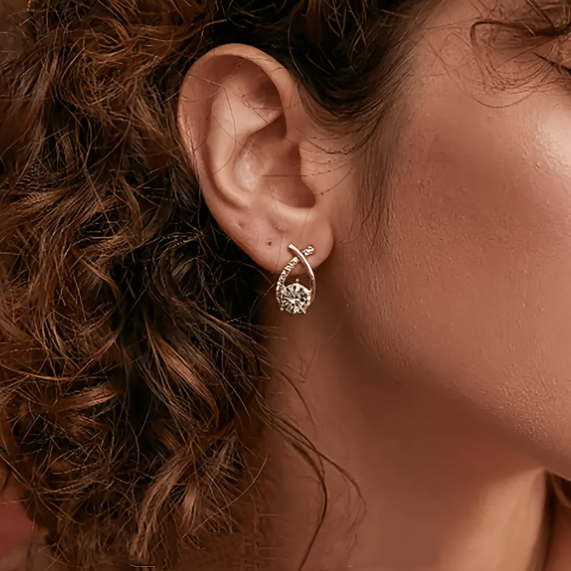 Milena | Pendientes de botón con diseño de cruz, circonitas y acabado dorado