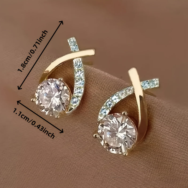 Milena | Pendientes de botón con diseño de cruz, circonitas y acabado dorado