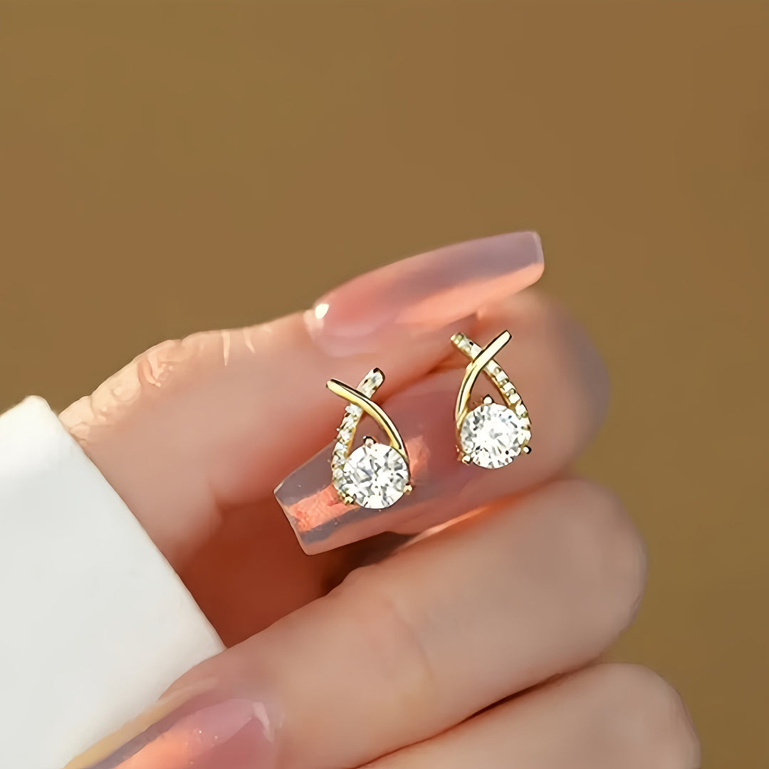 Milena | Pendientes de botón con diseño de cruz, circonitas y acabado dorado