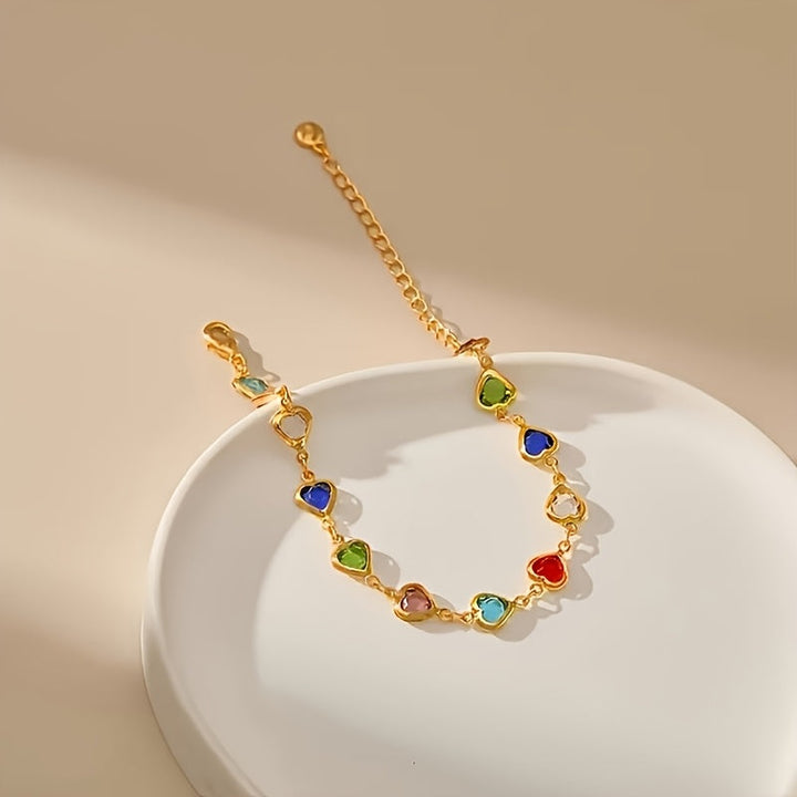 Valeska | Pulsera fina con silueta de corazón y acabado dorado