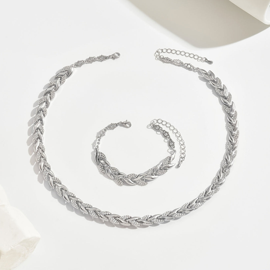 Rocío | Conjunto de collar y pulsera de cola de pez con strass y acabado brillante