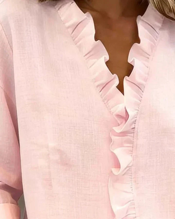 Anora |  Blusa con volantes y cuello en V