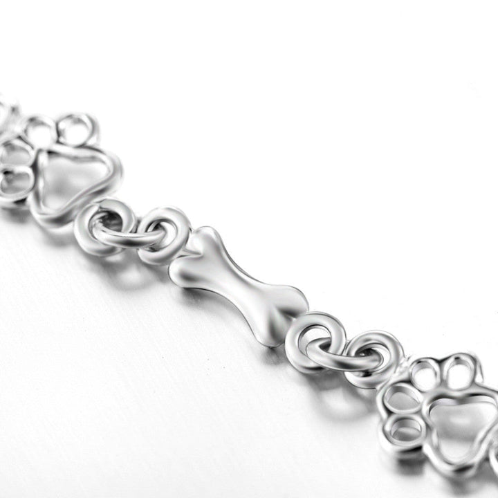 Pulsera de Encanto de Huella de Perro y Hueso de Plata Pura Edición Limitada