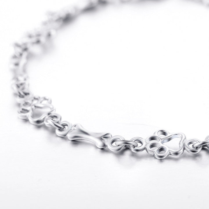 Pulsera de Encanto de Huella de Perro y Hueso de Plata Pura Edición Limitada