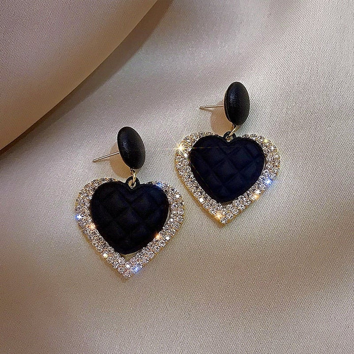 Aitana | Pendientes en forma de corazón con acabado de oro negro