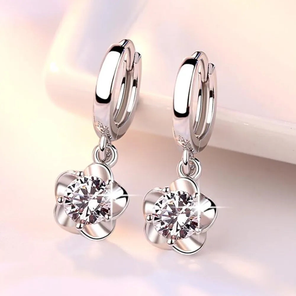 Beatriz | Pendientes con circonitas moradas y blancas con acabado plateado
