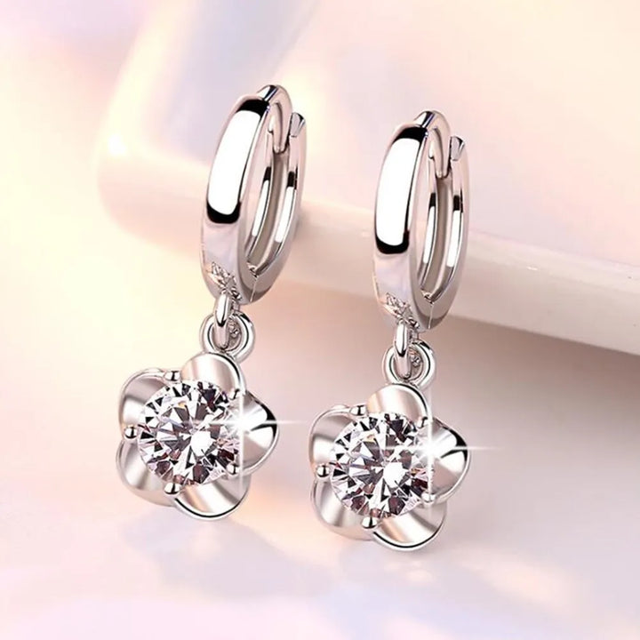 Beatriz | Pendientes con circonitas moradas y blancas con acabado plateado