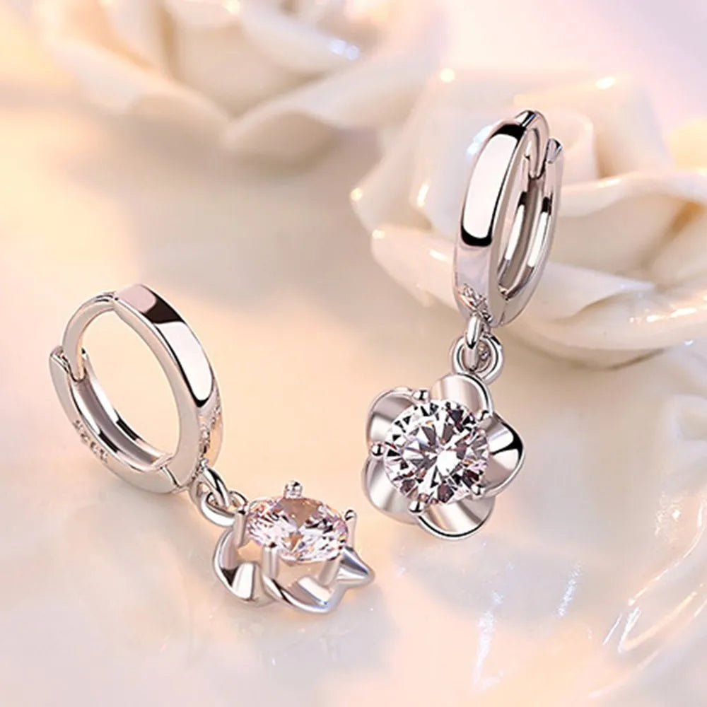 Beatriz | Pendientes con circonitas moradas y blancas con acabado plateado