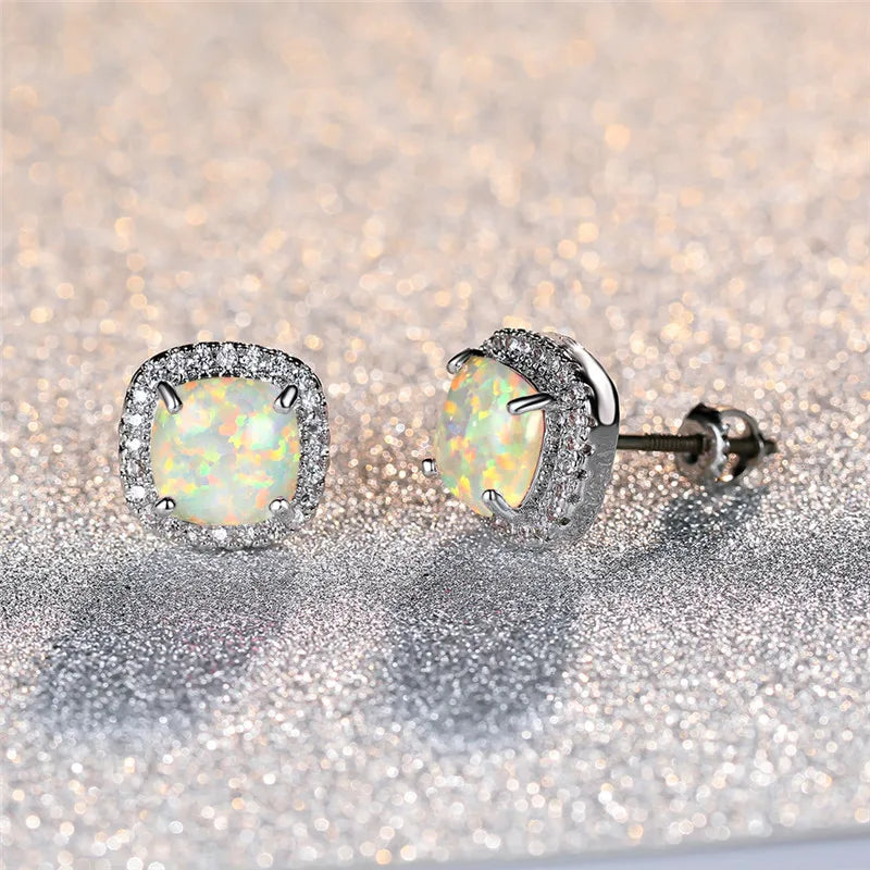 Itziar | Pendientes elegantes con ópalo de fuego blanco y acabado plateado