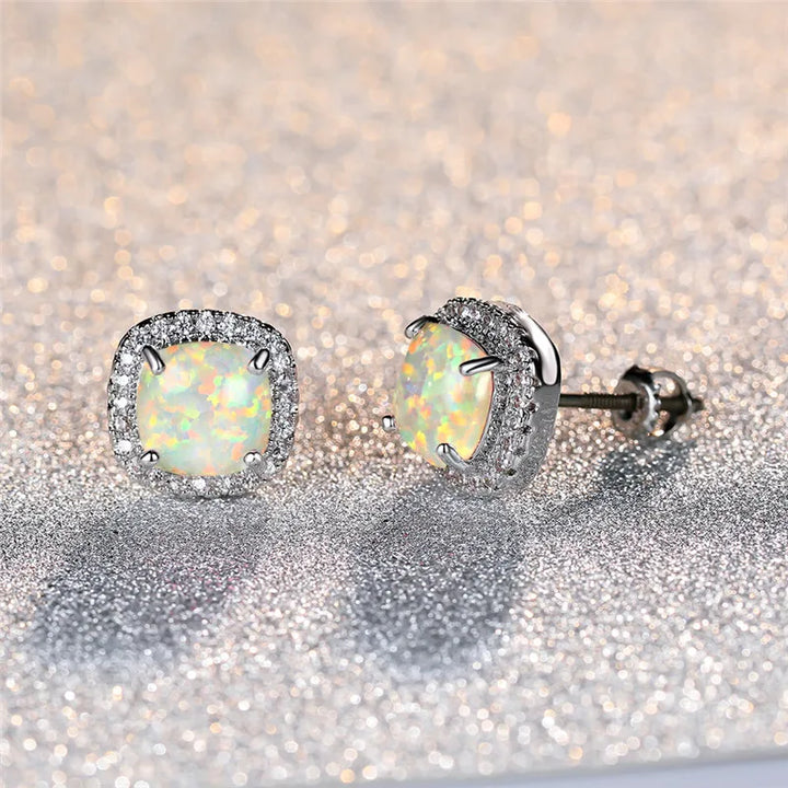Itziar | Pendientes elegantes con ópalo de fuego blanco y acabado plateado