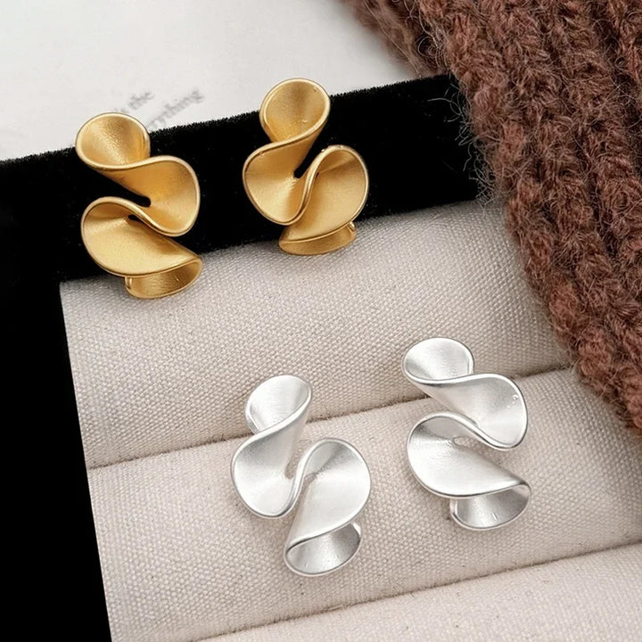 Elena | Pendientes bicolor con acabado dorado y plateado