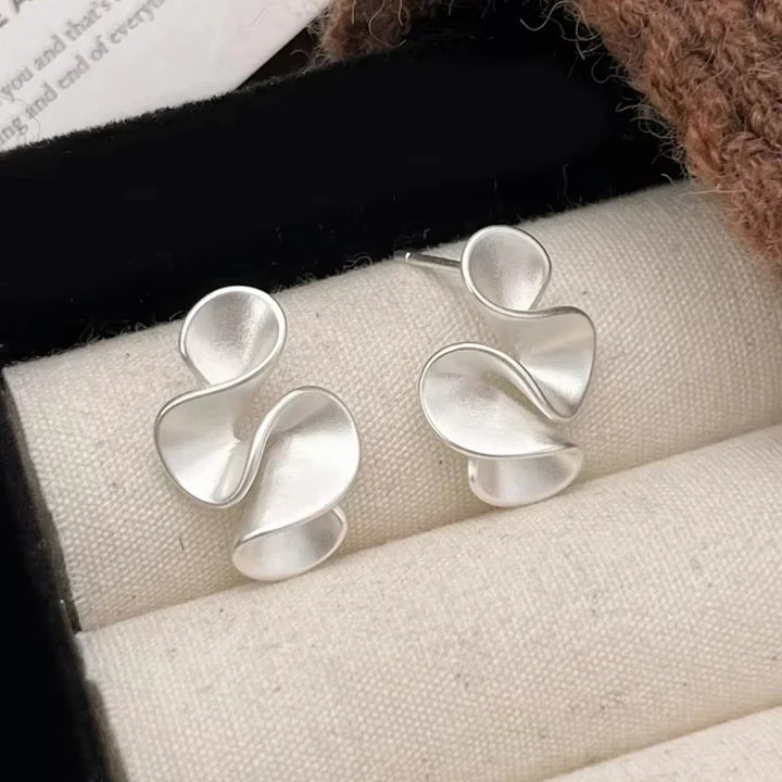 Elena | Pendientes bicolor con acabado dorado y plateado