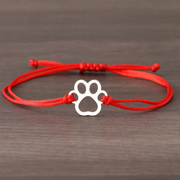 Pulsera de Cuerda con Huella de Patita – Diseño Ajustable en Negro y Rojo