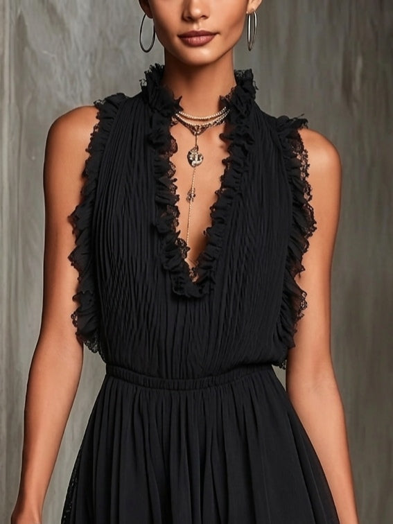 Mono de Chiffon Plisado Negro con Bordo de Volantes