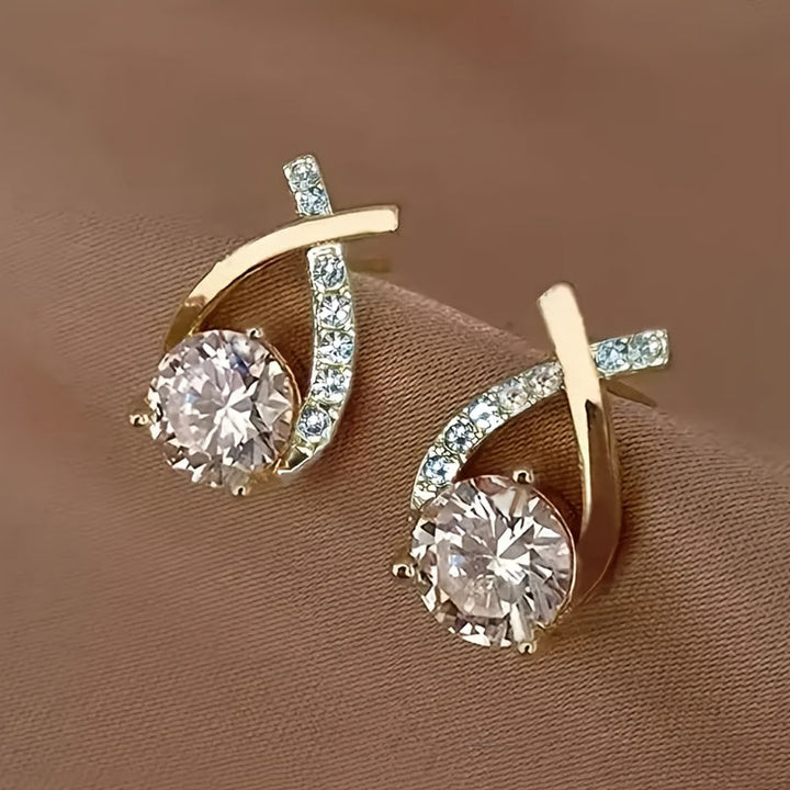 Milena | Pendientes de botón con diseño de cruz, circonitas y acabado dorado