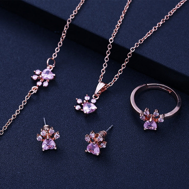Conjunto de Joyería de Huella en Oro Rosa – 4 Piezas con Corazón de Circonia (Anillo, Collar, Pendientes, Pulsera)